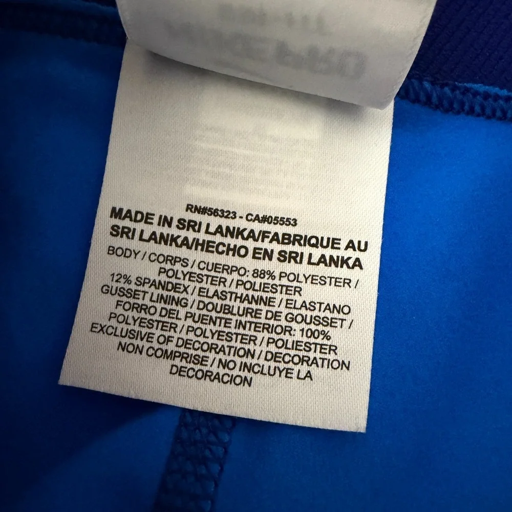 Nike shows slight